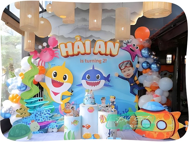 backdrop trang trí sinh nhật chủ đề baby sharrk tại nhà